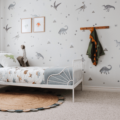 Picture of a children's room with watercolour dinosaur wall decals 