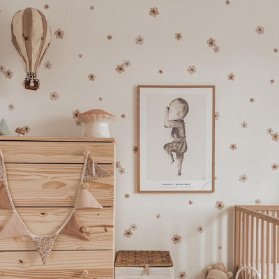 Picture of a baby nursery with watercolour small brown and white flowers