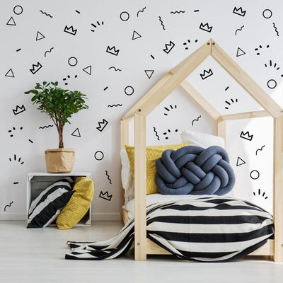 Picture of children's room with black playful shapes wall decals