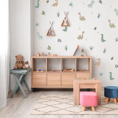 Picture of a play room with green, brown and beige dinosaur wall decals with foliage and flowers