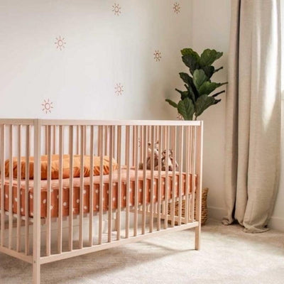 Picture of a nursery with nut brown wall decals