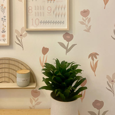 Colourful garden flower fabric wall decals featuring a variety of blooms. These non-toxic decals are designed for easy application and removal, perfect for enhancing the decor of any space with a touch of nature.