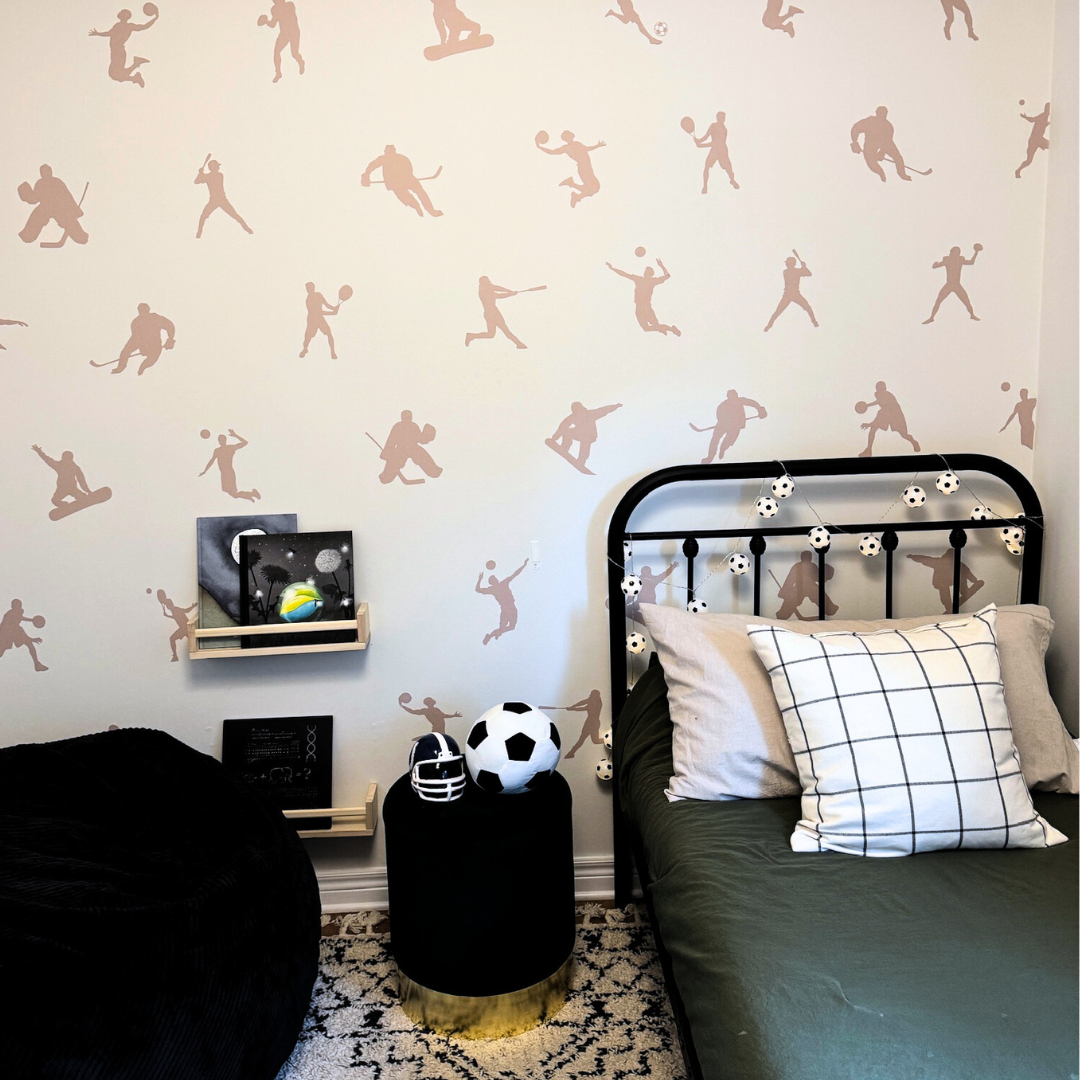 Fabric wall decals featuring dynamic sport players in action in child's room. Perfect for inspiring young athletes and adding a sporty vibe. 