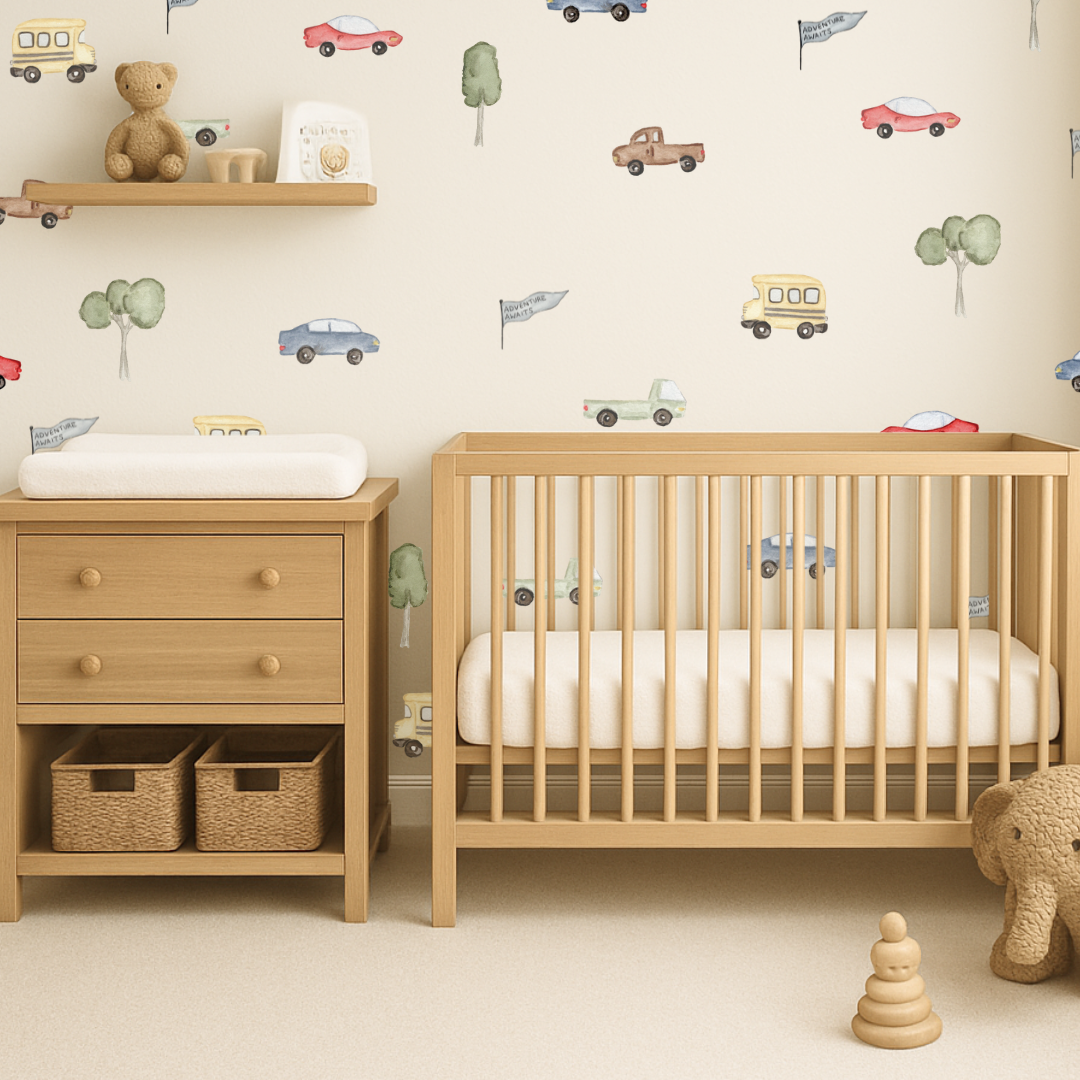 Nursery room with wooden crib, dresser, and toys against a wall with vehicle wall decals