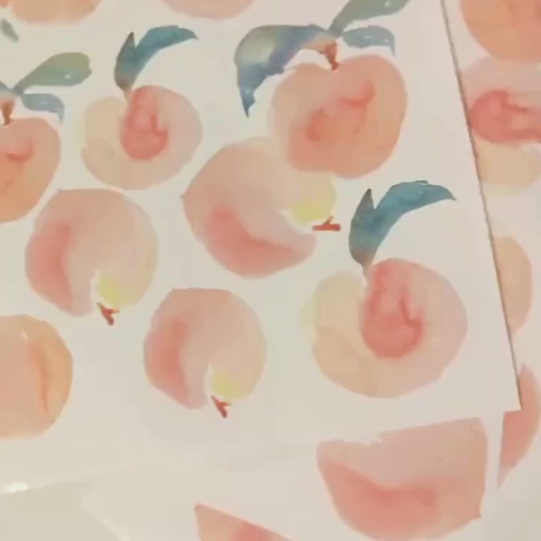 Video of fabric wall decals featuring charming peaches. 