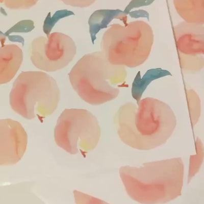 Video of fabric wall decals featuring charming peaches. 