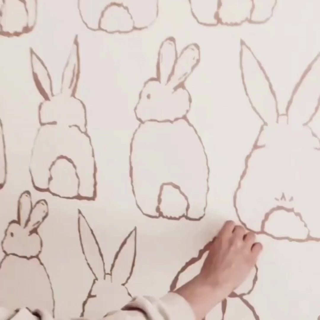 A video of the cutest bohemian play room with bunny bum wall decals adding a playful touch to the room. 