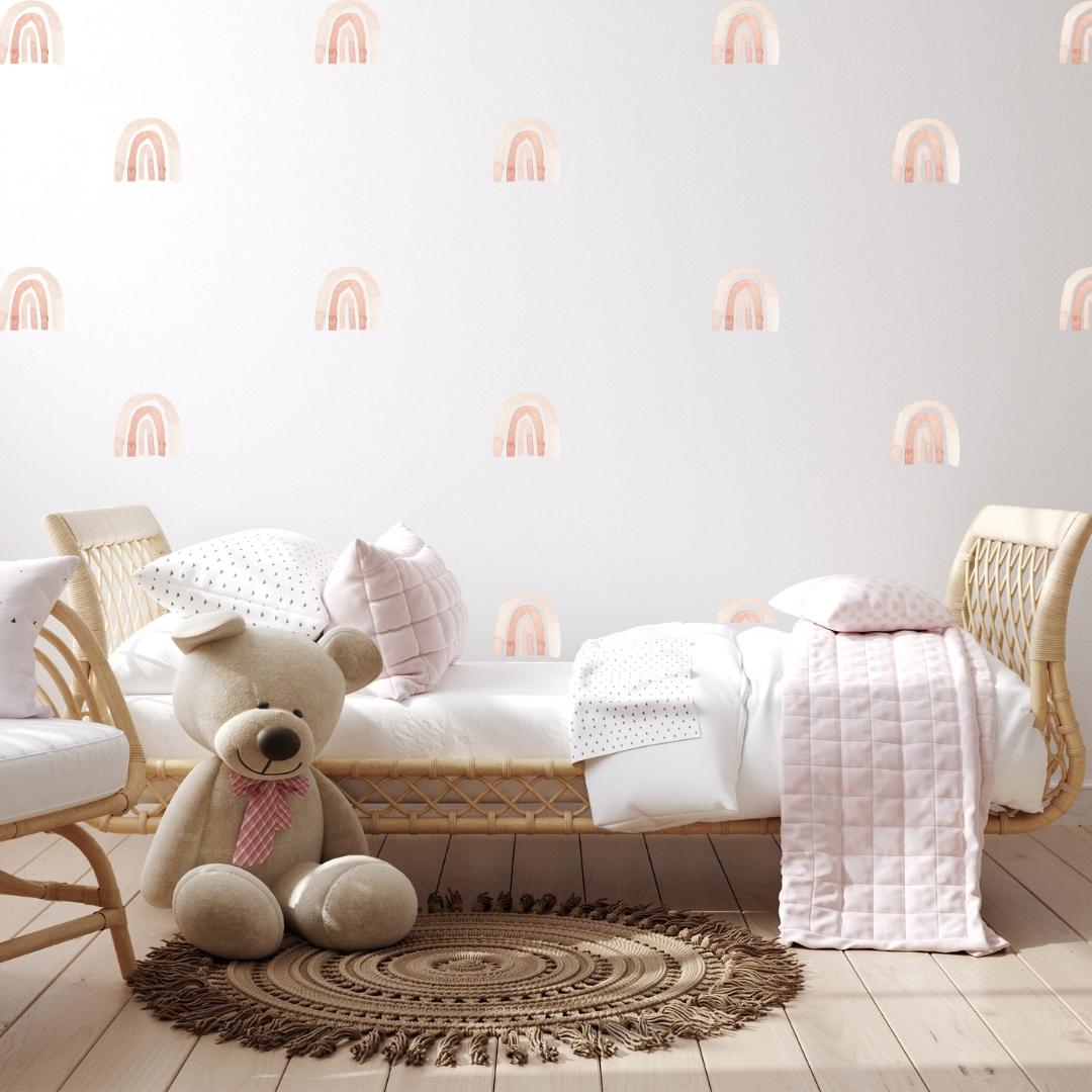 Picture of a little girls bedroom with watercolour rainbow wall decals