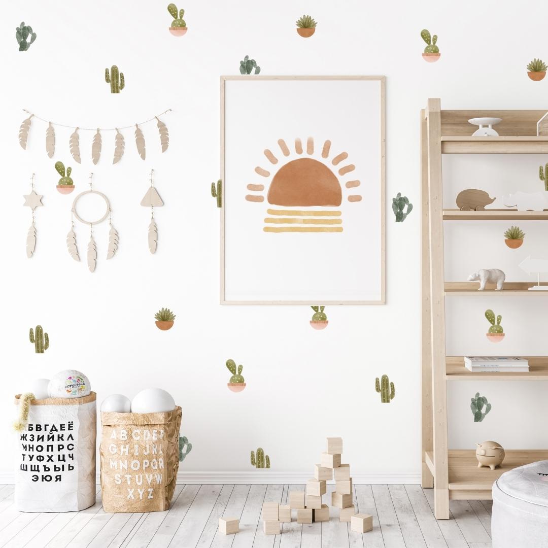 Bedroom with fabric wall decals featuring a variety of cacti and plants, showcasing vibrant colours that bring a touch of nature indoors. 