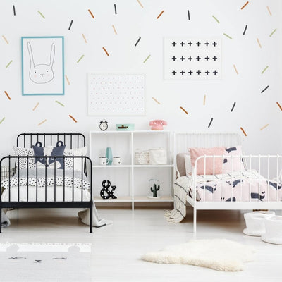 Fabric wall decals featuring a playful assortment of colourful confetti dots, perfect for adding a festive and cheerful touch to your kids room