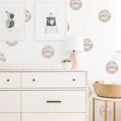 Cute lion fabric wall decals in a nursery that are non-toxic and removable, featuring playful designs suitable for children's rooms.