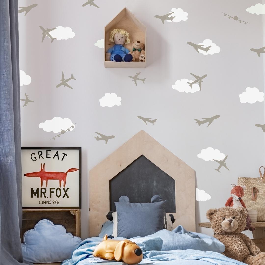 Picture of a  bedroom with plane and clouds wall decals