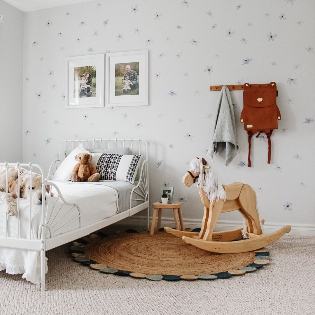 Picture of a children's bedroom with vintage blue and grey wall decals