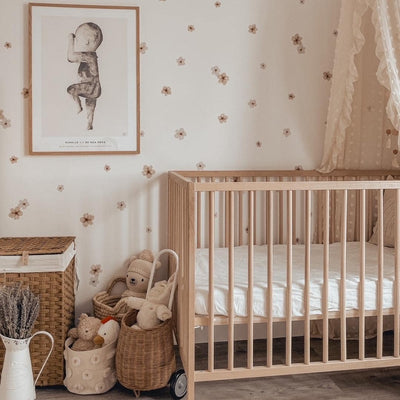 Picture of a nursery with watercolour warm brown and white small flowers wall decals  Edit alt text