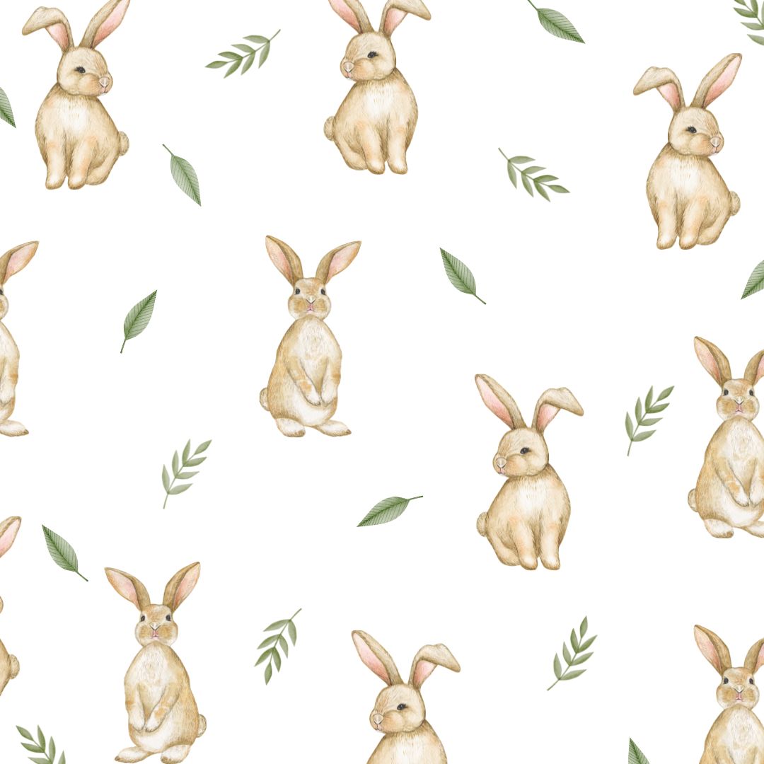 Soft fabric wall decals featuring playful bunnies surrounded by various leaves, creating a whimsical and nature-inspired decor.

